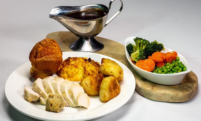 Enjoy a Sunday roast - chicken, beef or nut roast!